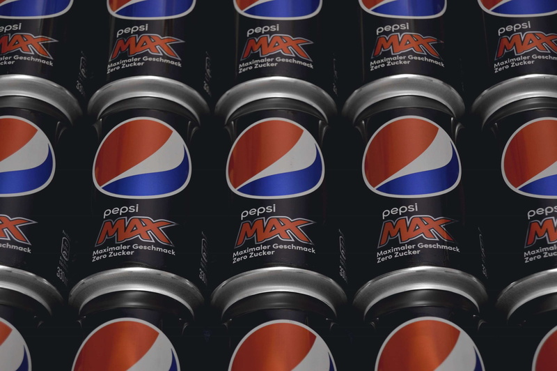 order, arrangement, red, technology, in a row, repetition, side by side, white color, backgrounds, no people, for sale, still life, pepsi max cans, multi colored