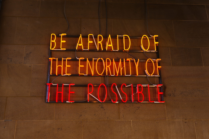 architecture, day, capital letter, signage, design, quote, information sign, orthographic symbol, red, lighted, afraid, no people, message, neon, enformity