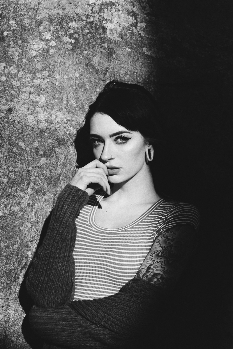 fashion, face, real people, putting, beautiful woman, adult, grayscale, woman, hand, holding, casual clothing, contemplation, lifestyles, photography, young adult