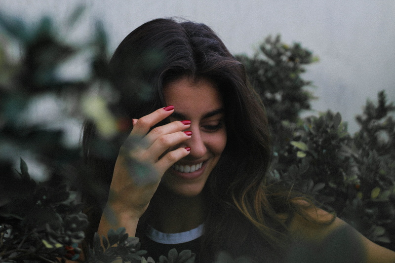 one person, bush, headshot, tree, using, adult, woman, face, front view, hairstyle, right, portrait, plants, florest, contemplation, person, female, young adult