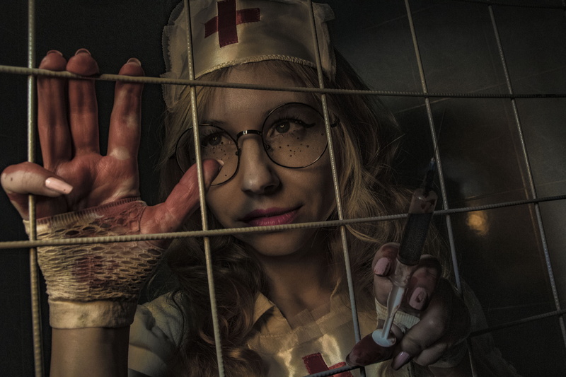 a patient, misfortune, a horror movie, building, social issues, justice - concept, red cross, prison cell, suffering, brains, dark, cage, prison, adult