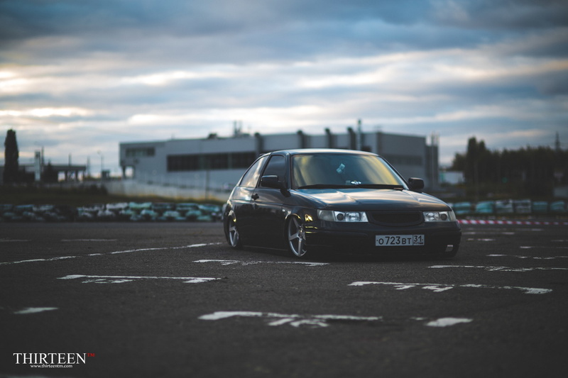 BPAN, cloud - sky, hatchback, photographer, street, 2K, road, day, selective focus, nature, marking, black, city, auto, Lada, machine, text, symbol, no people