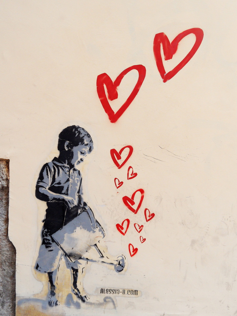 pouring, holding, boy, people, indoors, built structure, can, wall, one woman only, western script, craft, only women, heart shape, architecture, hearts