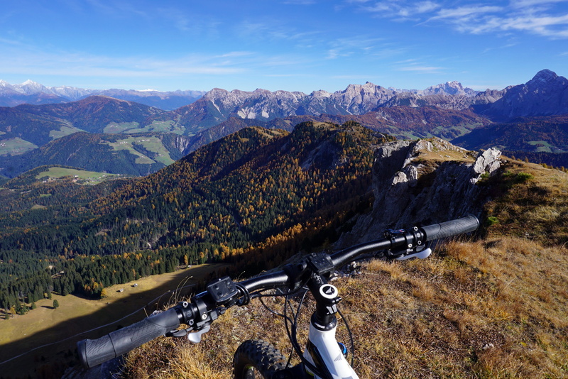 mountain peak, outdoors, cold temperature, non-urban scene, beauty in nature, day, high angle view, idyllic, fantastic, sas dla crusc, dolomites, bicycle