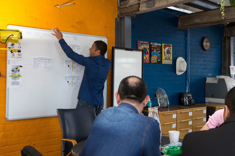 meeting, mature men, Strategy, board, talking, occupation, real People, arms raised, young Men, limb, human body part, casual Clothing, standing, cooperation