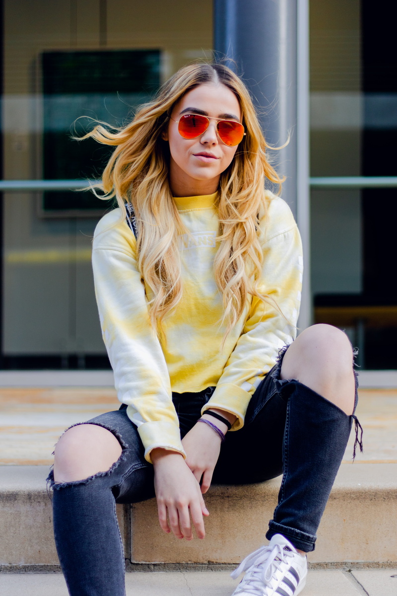 coat, accessories, real people, white, one person, female, young women, boot, shirti, clothing, blond hair, long sleeve, glasses, sleeved, sleeve, person