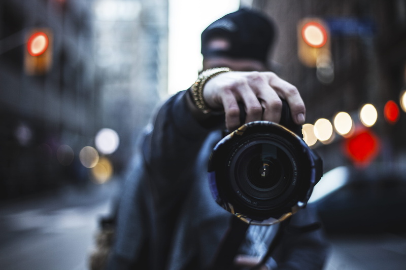 city life, surrounded, focus on foreground, shoot, pavement, photography, building exterior, bokeh, obscured face, casual clothing, adult, 4K, city, nikon