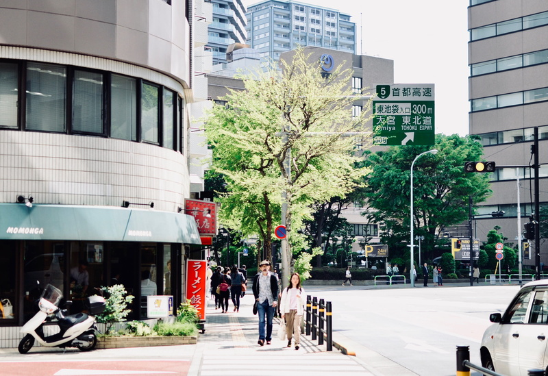 office building exterior, day, modern, momonga cafe and roastery, architecture, plant, mode of transportation, incidental people, 4K, built structure