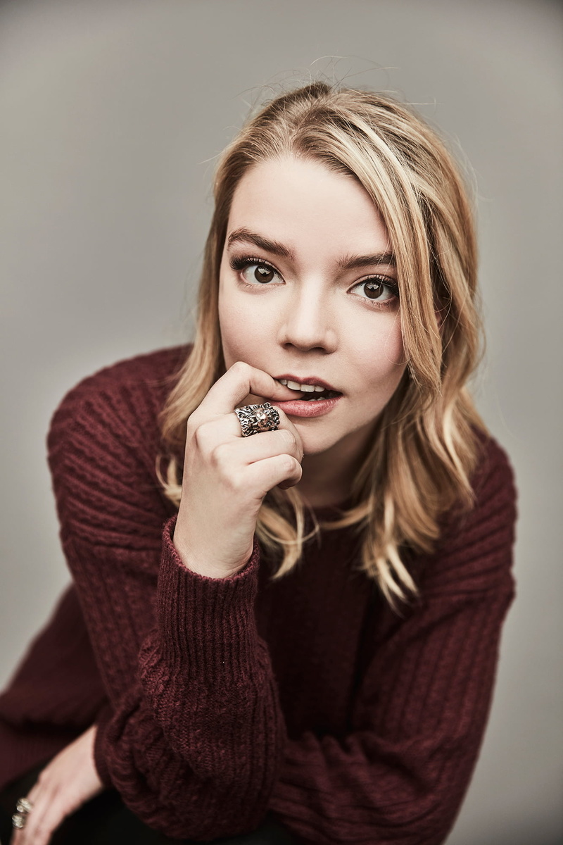 women, portrait, actress, simple background, finger in mouth, looking at viewer, sweater, blonde, 1080P, Anya Taylor-Joy