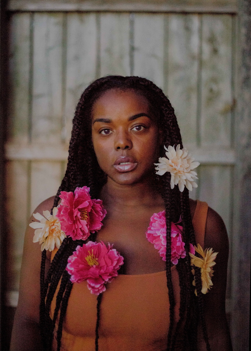 real people, floral, female with flowers, multicolored, flowers, hairstyle, lifestyles, adult, portrait, flower head, melanin, natural, front view, flowers in hair