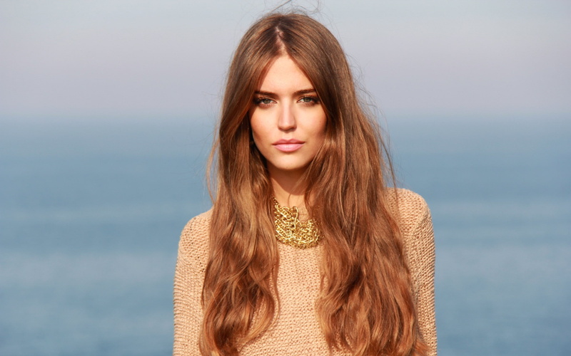 young adult, brown hair, teenager, outdoors, 2K, women, long hair, one person, beautiful woman, model, standing, hair, horizon over water, hairstyle, brunette
