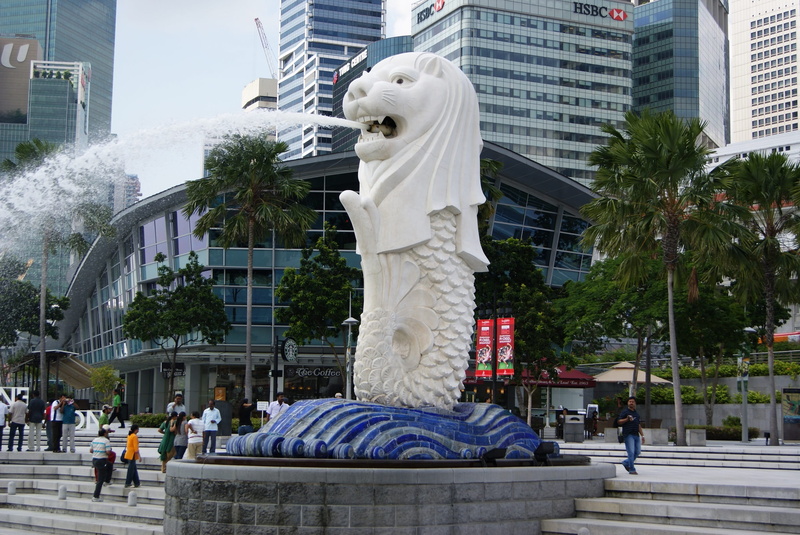 sculpture, symbol, male likeness, fish body, incidental people, architecture, plant, lion head, building exterior, office building exterior, 2K, creativity