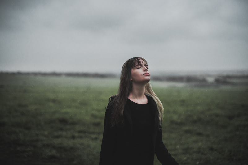 cold, long hair, focus on foreground, one person, blonde hair, nature, waist up, outdoors, dark, beauty, black sweater, lady, young women, black, standing