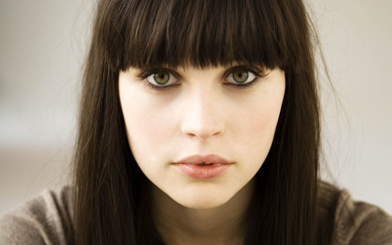 indoors, face, green eyes, straight hair, hair, teenager, human face, young adult, front view, actress, headshot, bangs, close-up, young women, Felicity Jones