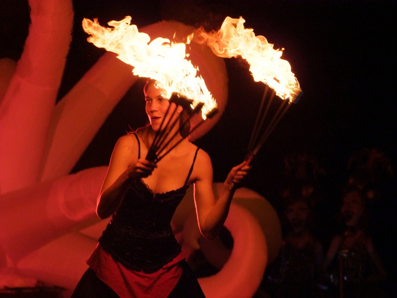 arms raised, burning, fire, mardi gras, flame, carnival, standing, 4K, juggler, skill, nighttime, arts culture and entertainment, performance, three quarter length