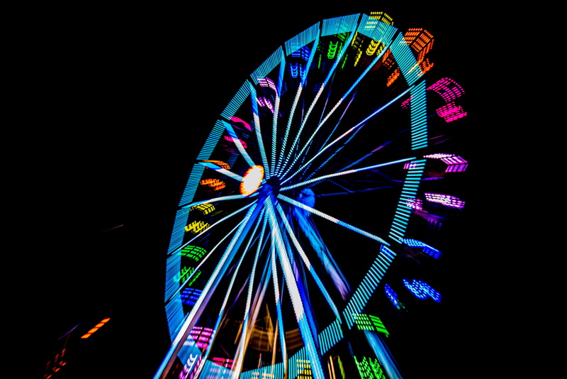multi colored, no people, wheel, entertainment, exhilaration, spinning, arts culture and entertainment, low angle view, evening, giant wheel, ferris wheel