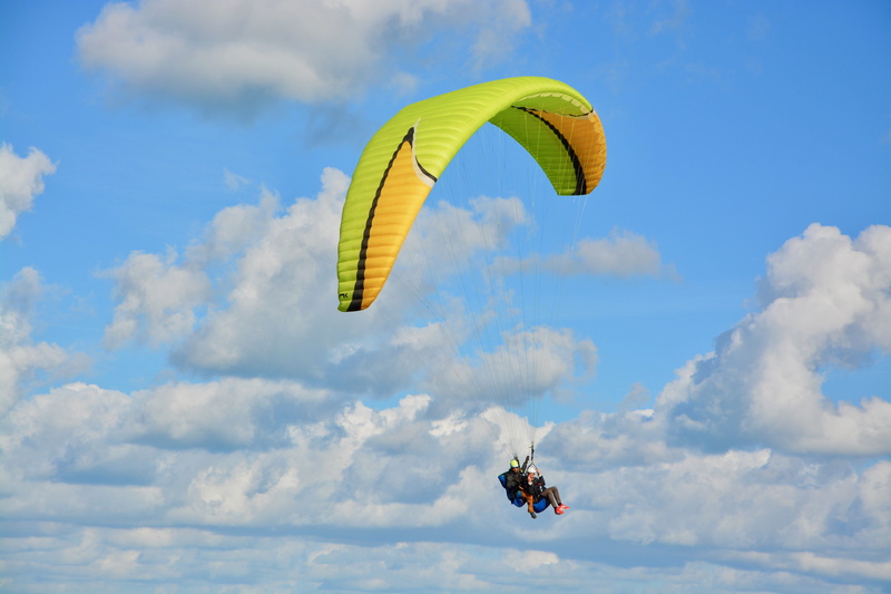 sport, atmosphere, parachute, sky, nature, one person, extreme sports, flying, unrecognizable person, aircraft, hobbies, outdoors, day, cloud - sky, cumulus