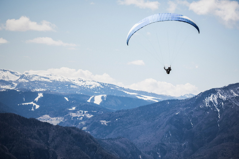 adventure, public domain, cold temperature, one person, air, scenics - nature, nature, flying, winter, risk, action, Alps, snowcapped mountain, blue, leisure Activity