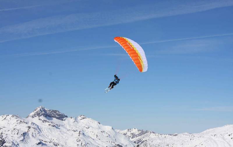 outdoors, real people, freedom, adventure, sport, mountain, snowcapped mountain, leisure activity, mountain range, unrecognizable person, flying, mid-air