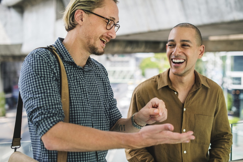 together, laughing, sign, smile, wireless, 2K, positive emotion, smiling, emotion, brown, jacket, connecting, network, two people, adult, man, cheerful