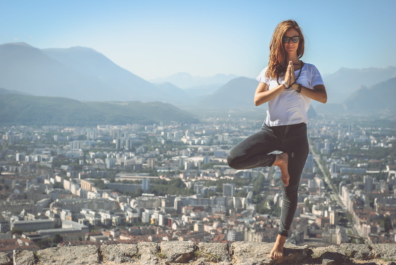 lifestyles, view, meditating, nature, leisure activity, respiration, mountain, position, full length, building exterior, one person, person, sunlight, standing
