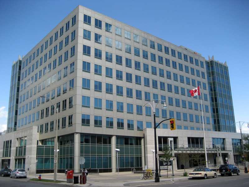 incidental people, architecture, city, sky, Ontario, Canada, office building exterior, mode of transportation, photos, window, land vehicle, transportation