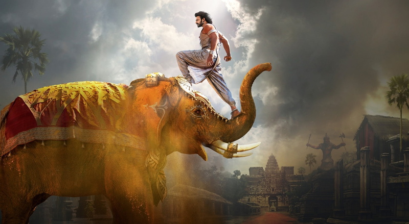 ride, animal wildlife, city, domestic animals, cityscape, Movies, adult, elephant, Other Movies, building exterior, 2017, one person, built structure, riding