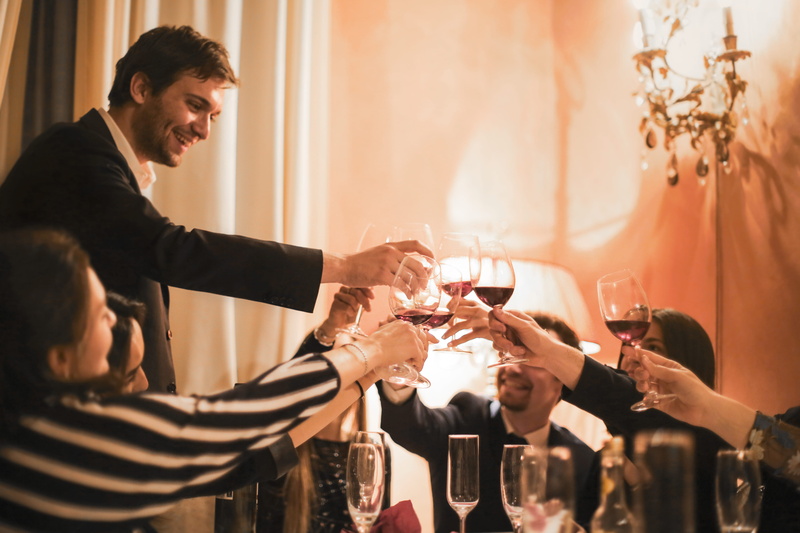 fun, glasses, happiness, indoors, beverage, toasting, drinks, drink, recreation, smiling, wineglass, wine, group together, alcohol, males, family, group of people