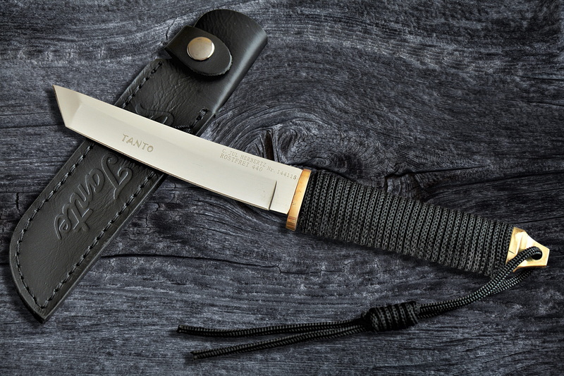 high angle view, 2K, textile, casual clothing, knife - weapon, wood - material, communication, close-up, weapon, equipment, tanto, table, surface, fashion