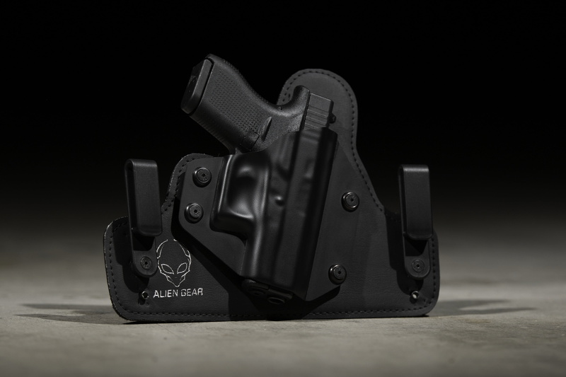 man made object, holster, close-up, 4K, owb, man made, black background, social issues, black color, conceal carry, flooring, studio shot, ccw, gun, iwb