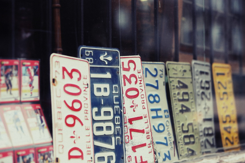 arts culture and entertainment, number, text, selective focus, non-western script, backgrounds, variation, focus on foreground, indoors, in a row, license plates