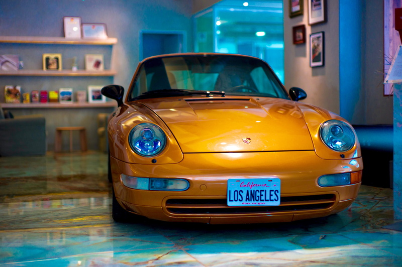 car, no people, light, 4K, headlight, vintage car, tire, license plate, night, vehicle, spoke, land vehicle, floor, indoors, automobile, coupe, toy car
