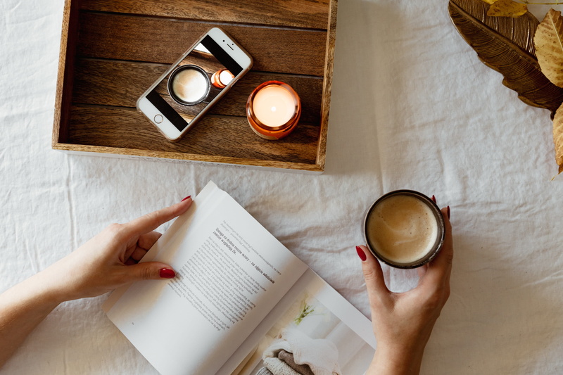 high angle view, holding, coffee cup, reading, food and drink, hands, opened book, adult, book, coffee - drink, woman, directly above, coffee, hand, flat lay