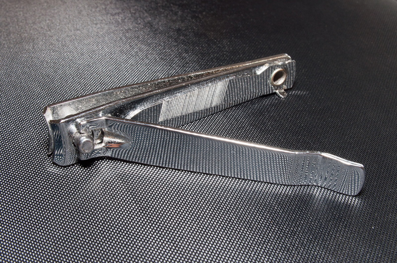 chrome, manicure, hand tool, nail clippers, metal, no people, nail clipper, table, full frame, silver colored, textile, 4K, close-up, zipper, tool, safety