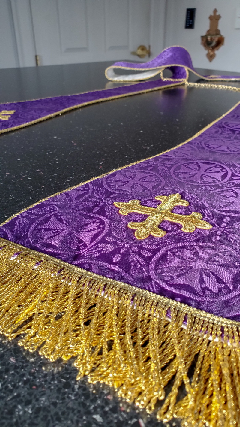 fashion, pink color, focus on foreground, high angle view, usa, still life, apparel, close-up, vestment, pattern, clothing, stitch, embroidery, rug, catholicism