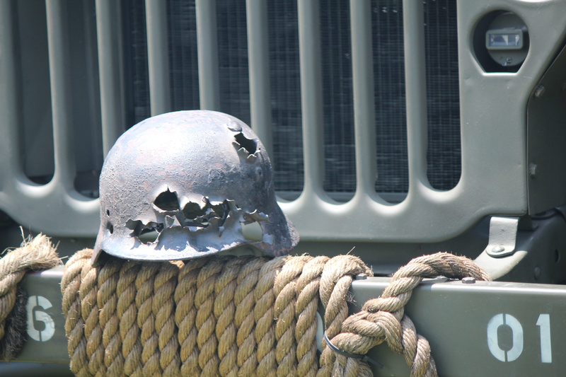 transportation, bollard, focus on foreground, ammunition, hat, nautical vessel, travel, green, conflict, protection, black, helmet, art and craft, combat