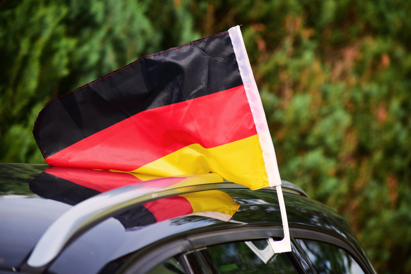 germany, focus on foreground, emotion, auto, plant, fan, mirroring, nature, yellow, mode of transportation, day, flag, national icon, sport, german flag