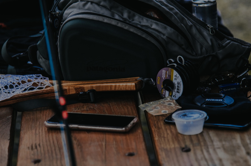 drink, glass, brown, indoors, old, duffel, fly fishing, close-up, fishing, container, seat, plastic, table, smartphone, still life, wood - material, surface