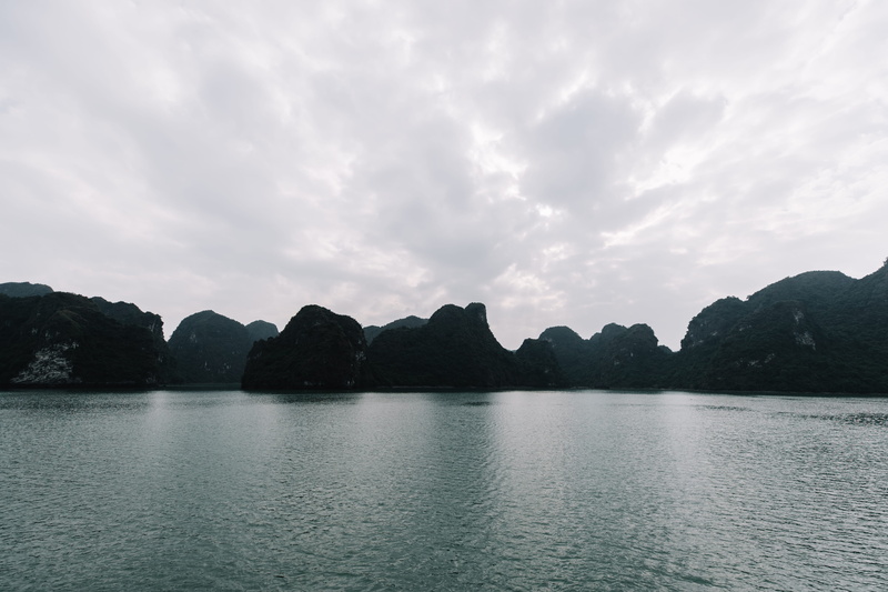 sea, promontory, nature, ocean, idyllic, remote, shoreline, cloud - sky, 5K, tranquil scene, outdoors, day, mountain range, reflection, mountain, waterfront