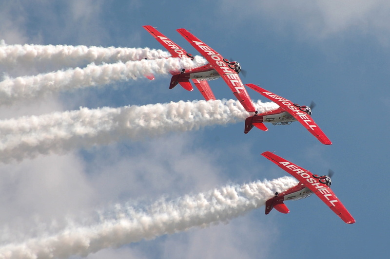 making, digital camera, sky, biplanes, teamwork, flight, outdoors, on the move, aviation, smoke - physical structure, people, cloud - sky, cooperation