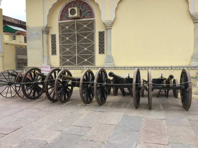 cannon, window, transportation, wall - building feature, tank, flooring, in a row, king, conflict, war, artillery, india, spirituality, tiled floor, history