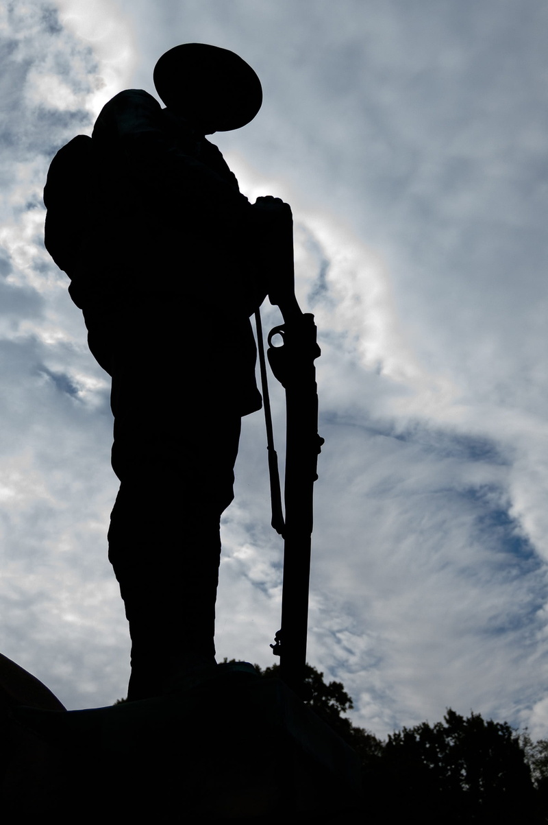 sky, rifle, outdoors, real people, lifestyles, british, human representation, leisure activity, dusk, men, ww1, holding, sculpture, memorial, hat, cloud - sky
