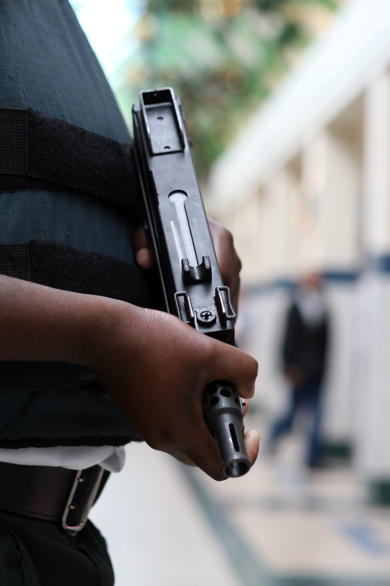 powerful, close, defense, male, outdoors, body, selective, protection, human body part, bullet, armed, machine gun, men, holding, smg, investigator, boss