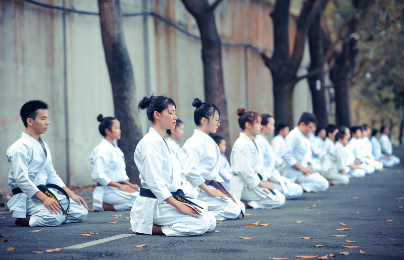 men, blackbelt, focus on foreground, real people, martial, group of people, meditating, outdoors, martial arts, training, side view, women, vietnam, karate gi