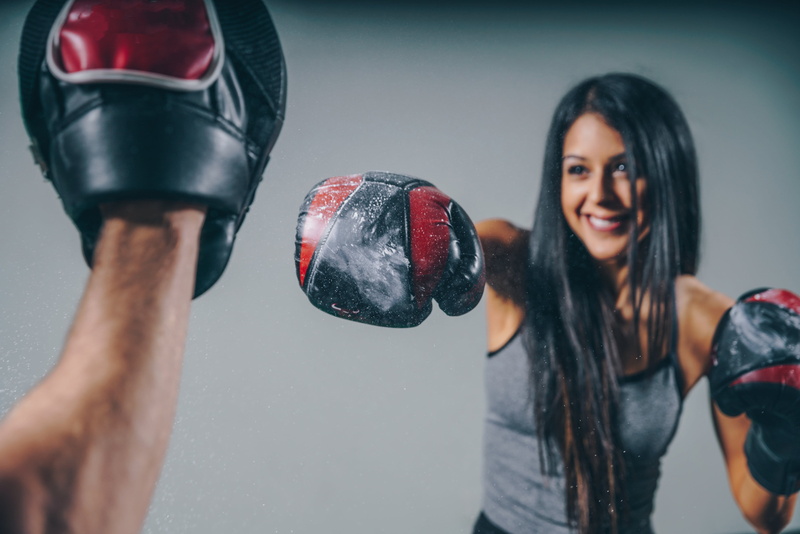 arms raised, adult, boxing glove, human limb, Boxing, sport, hand, combat sport, vitality, young adult, one person, Womens Day, young women, determination