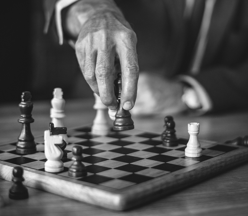 grayscale, arts culture and entertainment, choice, check, bw, battle, decisions, competition, leisure games, hand, chess, board game, chess board, chess piece