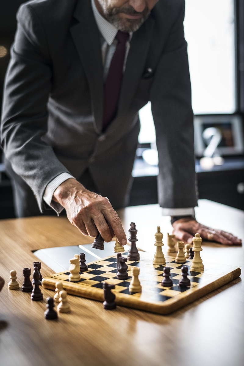 black, chess piece, playing, business person, chess, adult, 4K, battle, leisure activity, chessboard, management, midsection, leadership, arts culture and entertainment