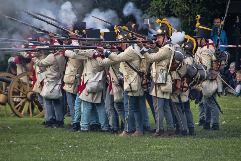 history, lifestyles, 5K, clothing, field, crowd, full length, shooting, outdoors, occupation, togetherness, government, nature, uniform, men, real people