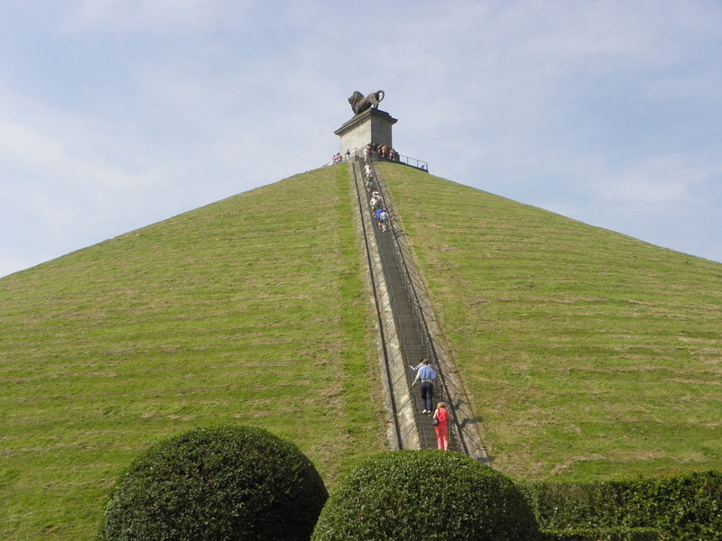 adults only, low angle view, grass, artwork, statue, creative, sculpture, construction, full length, Hill, metallic, plant, belgium, metal work, architecture