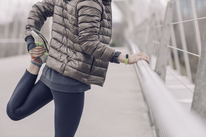 exercising, weather, focus on foreground, stretching, jacket, human body part, fitness, day, winter, vitality, exercise, clothing, holding, adult, leg